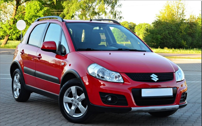 Suzuki SX4 cena 31900 przebieg: 93865, rok produkcji 2013 z Piastów małe 562